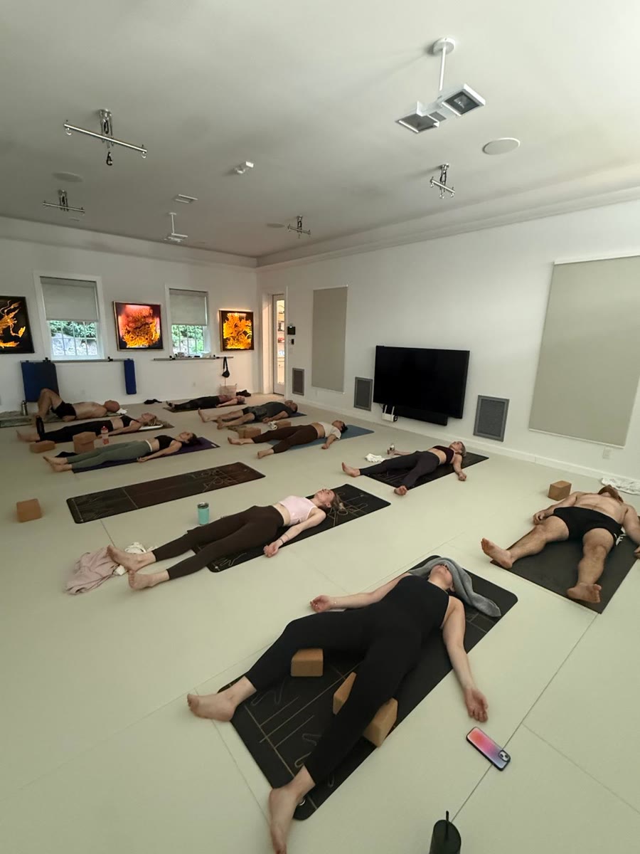 A group practicing inversions together